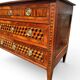 Louis XVI commode with marquetry featuring a design of precious wood cubes, 18th century.