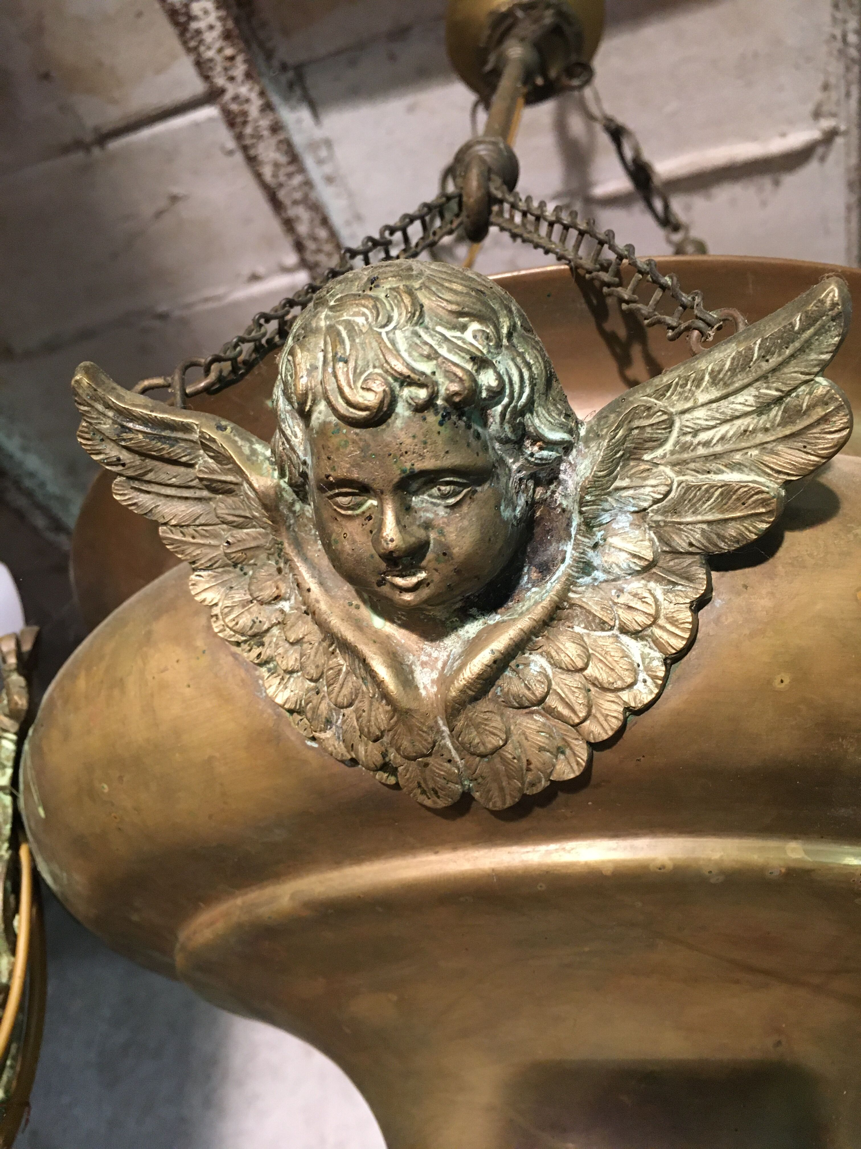 Brass chandelier with angels