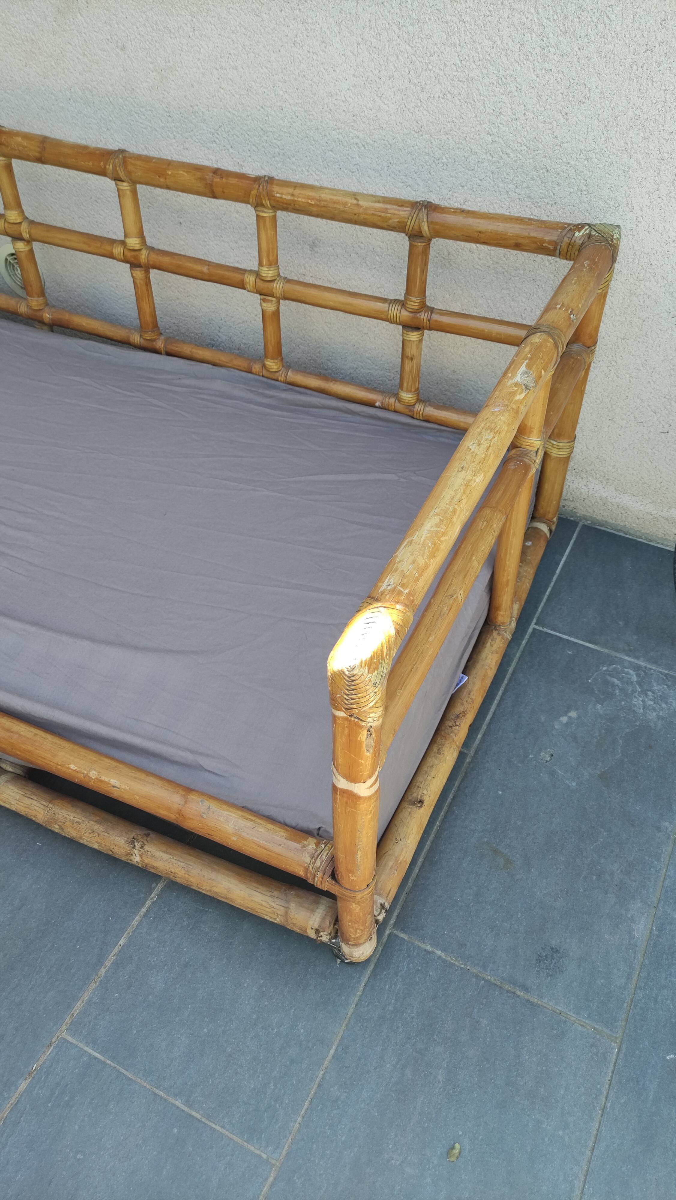 Large vintage rattan sofa bed