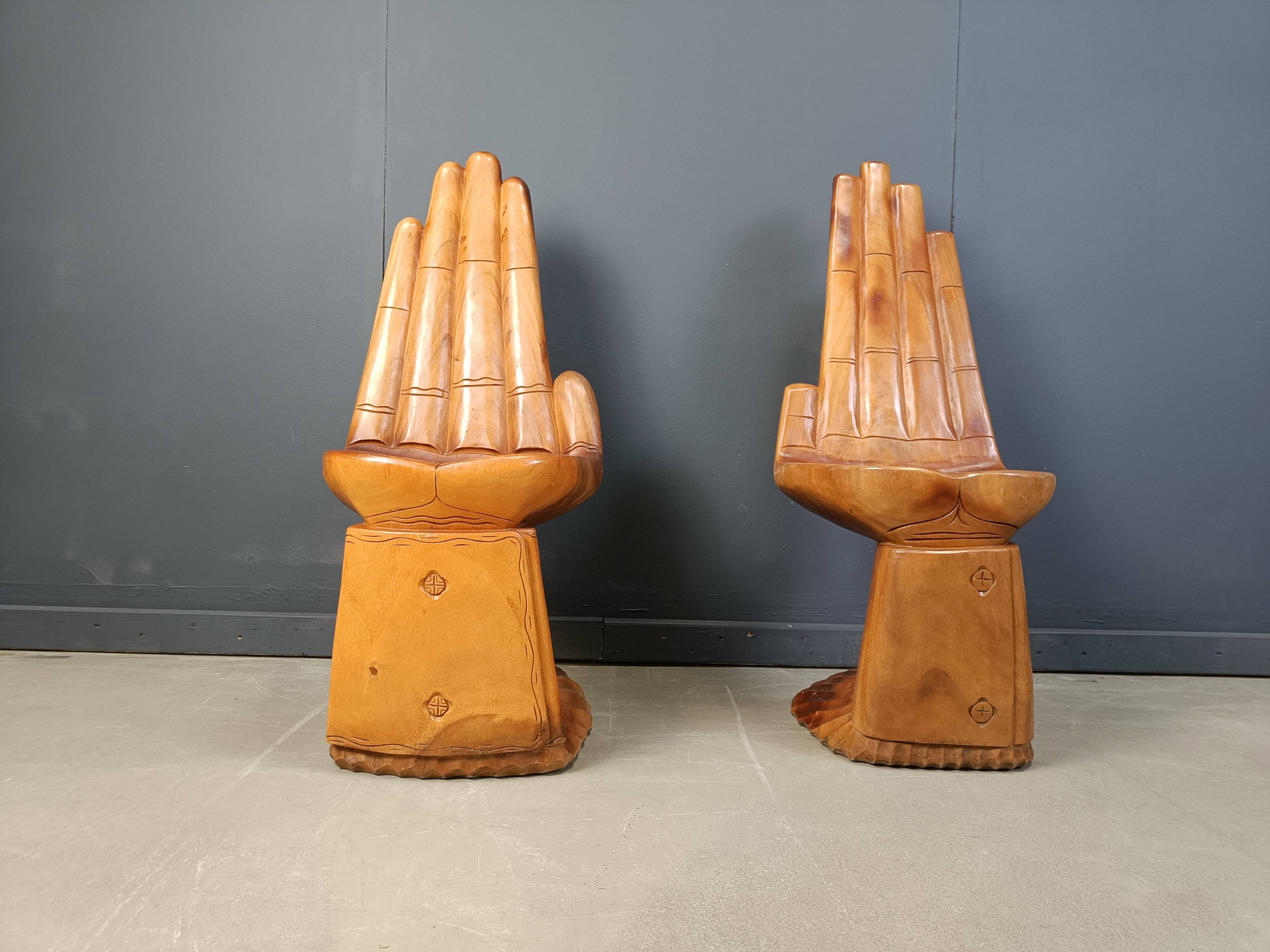 Pair of hand shaped teak chairs, 1970s
