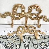 2 hooks in gilded brass