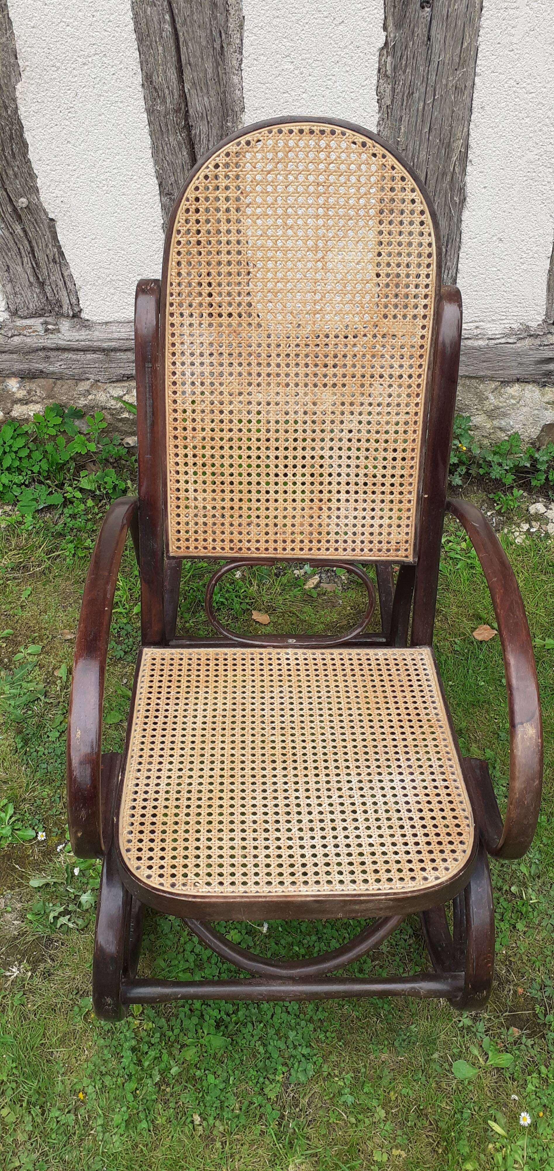Rocking chair with vintage wood and canework