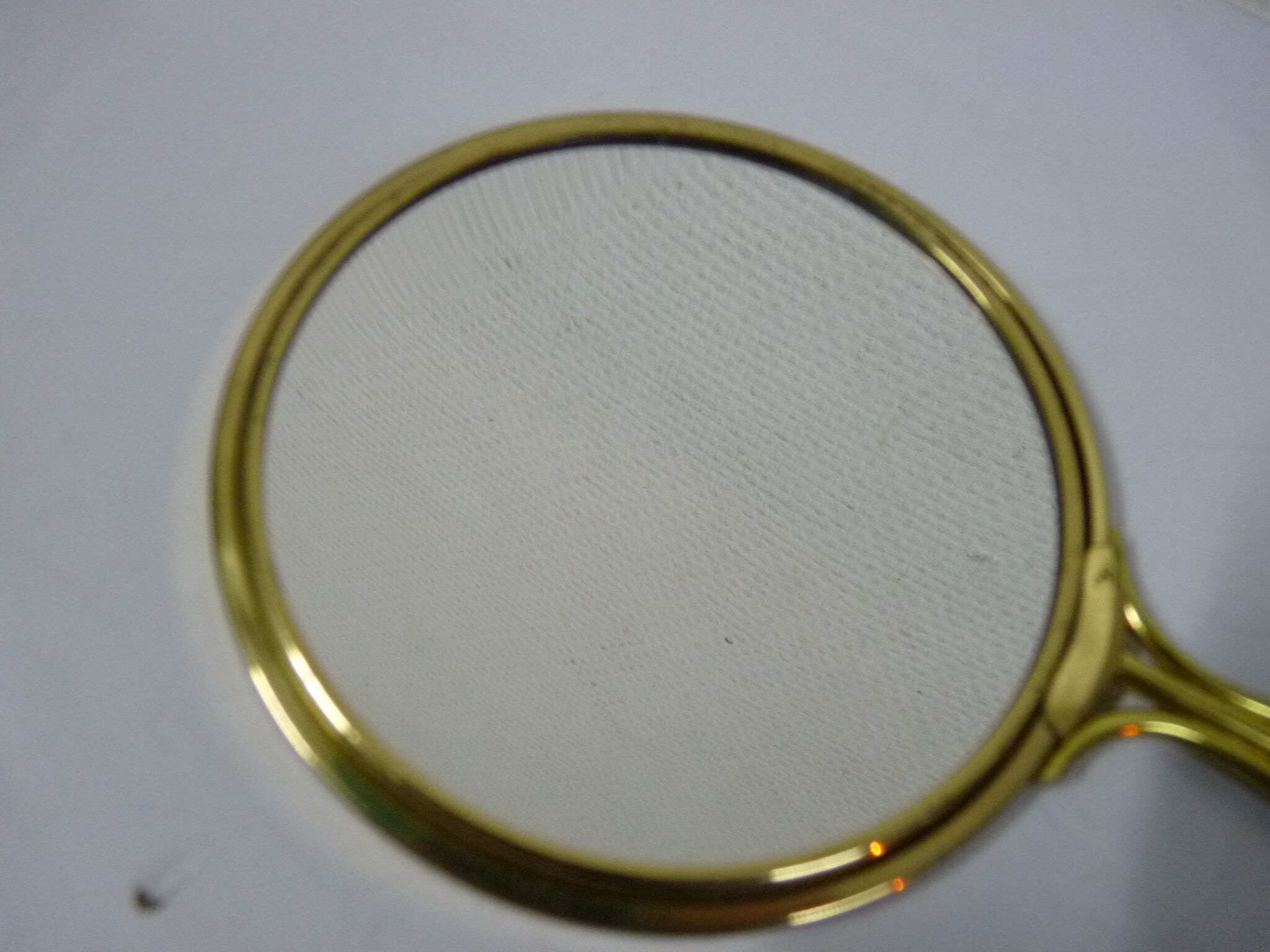 Old mirror double face with golden hand