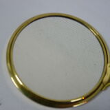 Old mirror double face with golden hand