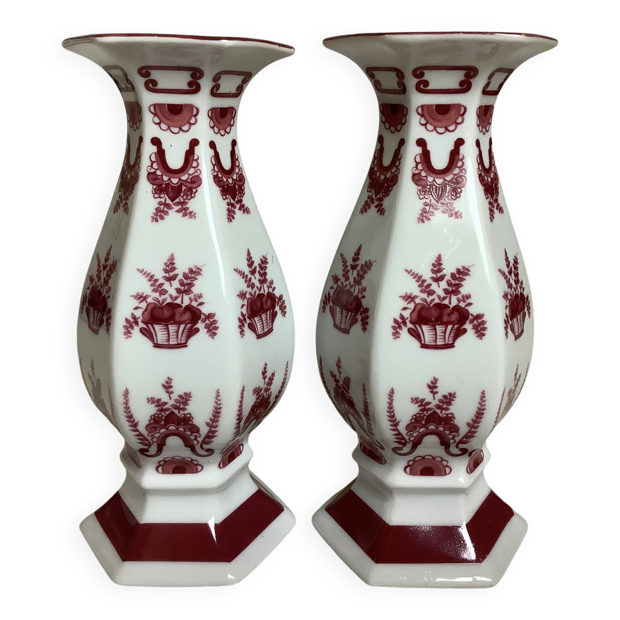 Pair of hexagonal burgundy candlesticks
