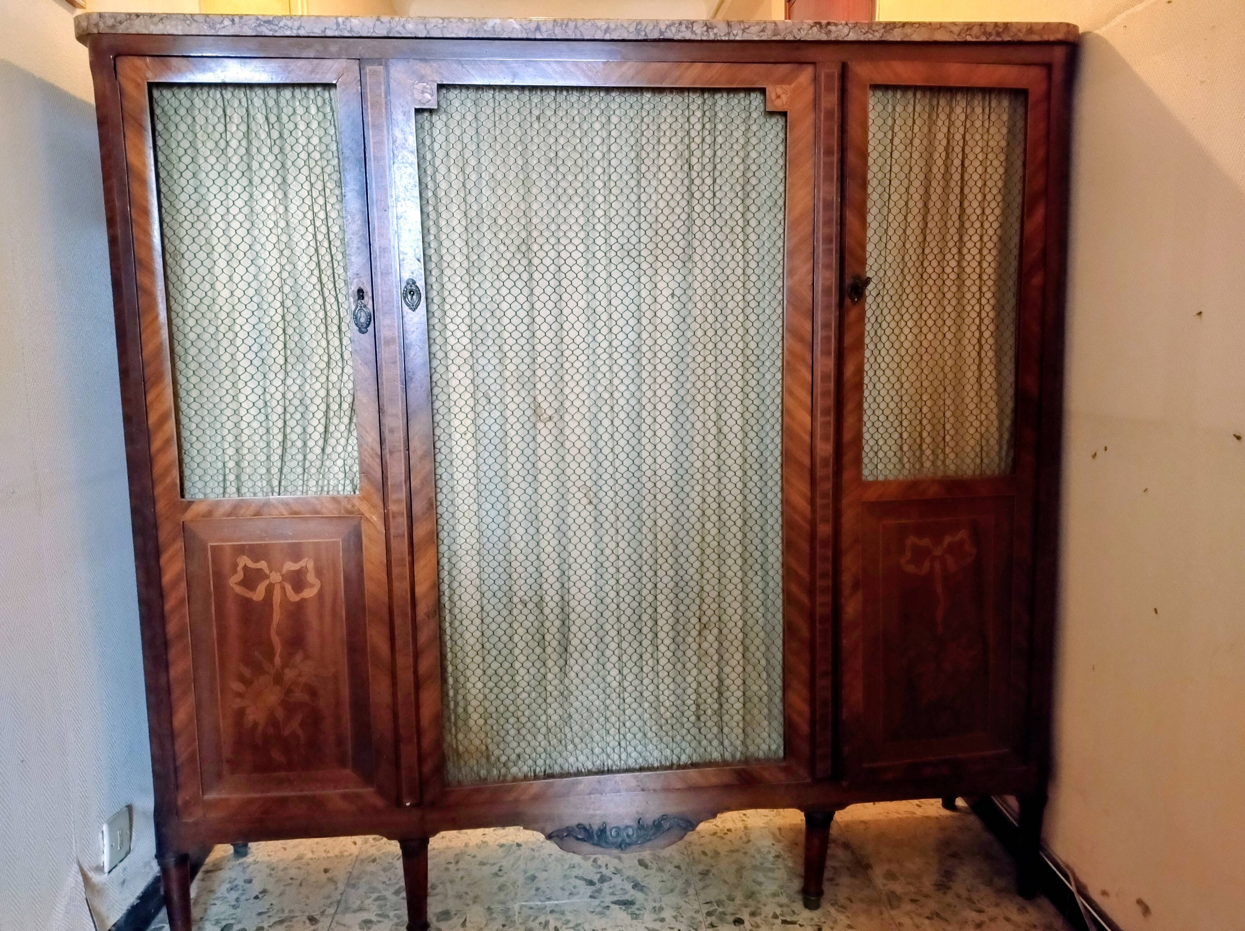 Antique wardrobe in Louis XVI style
