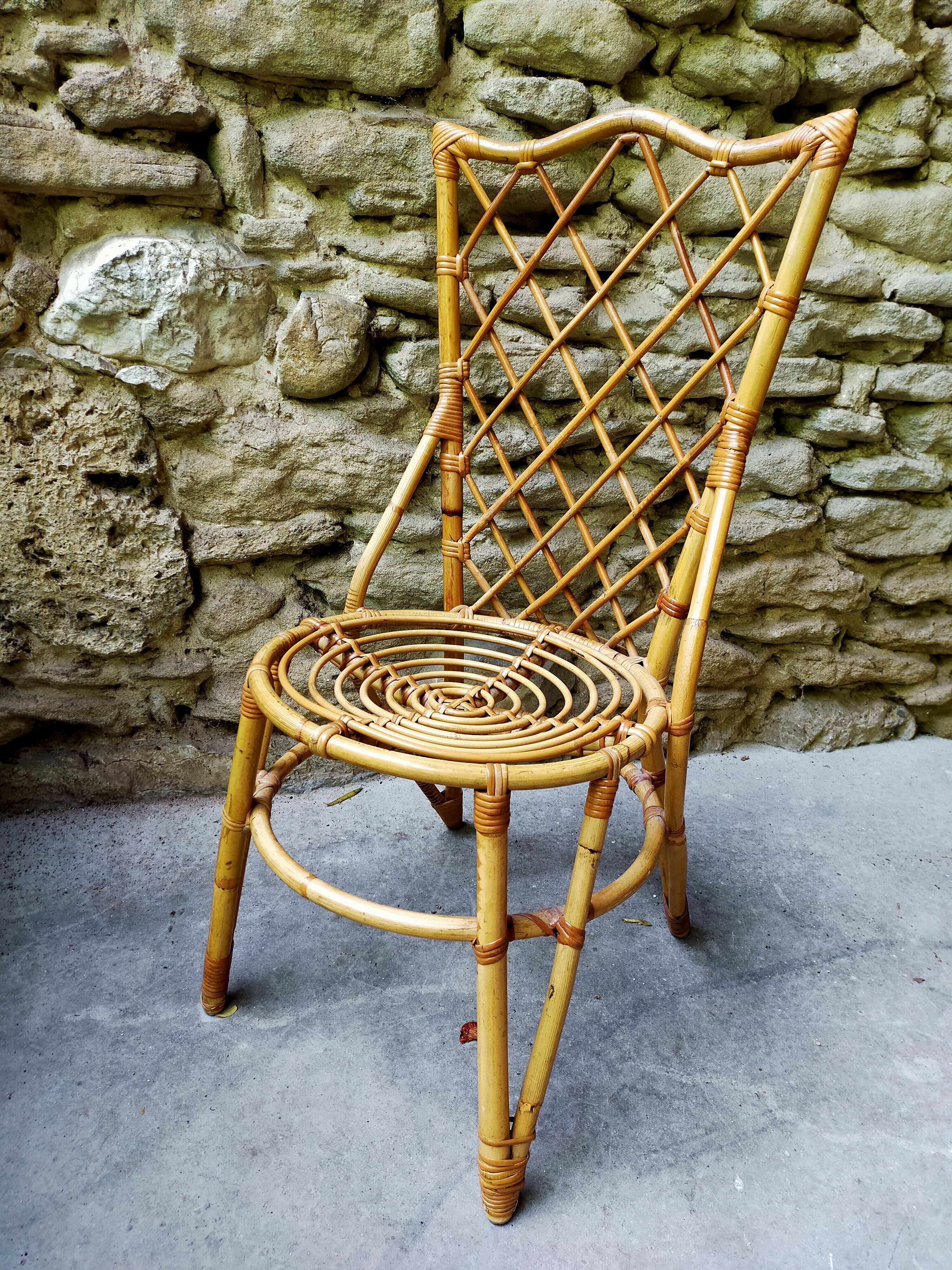 Suite of 4 chairs in rattan Louis Sognot