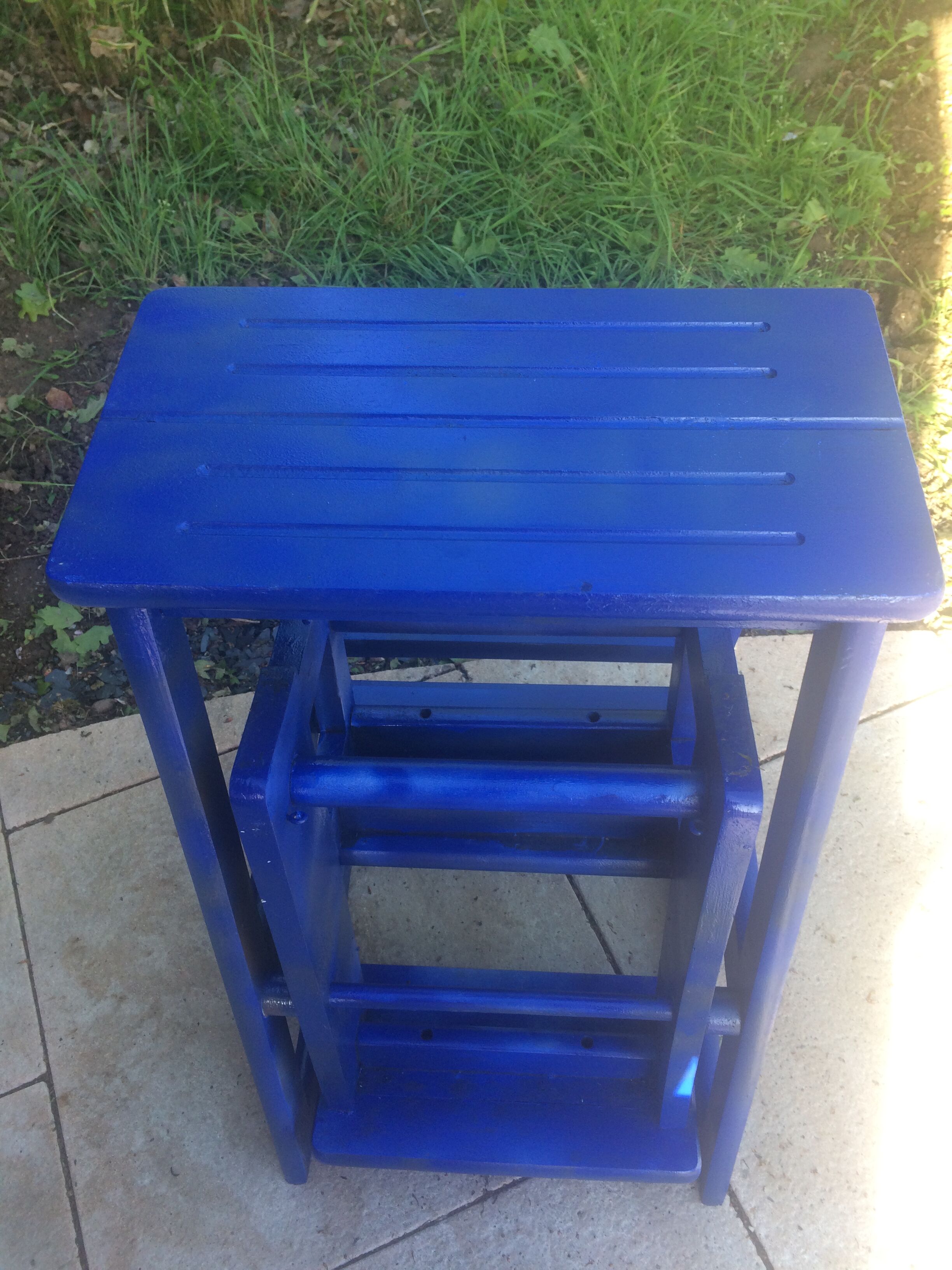 Foldable stepladder in small shelf
