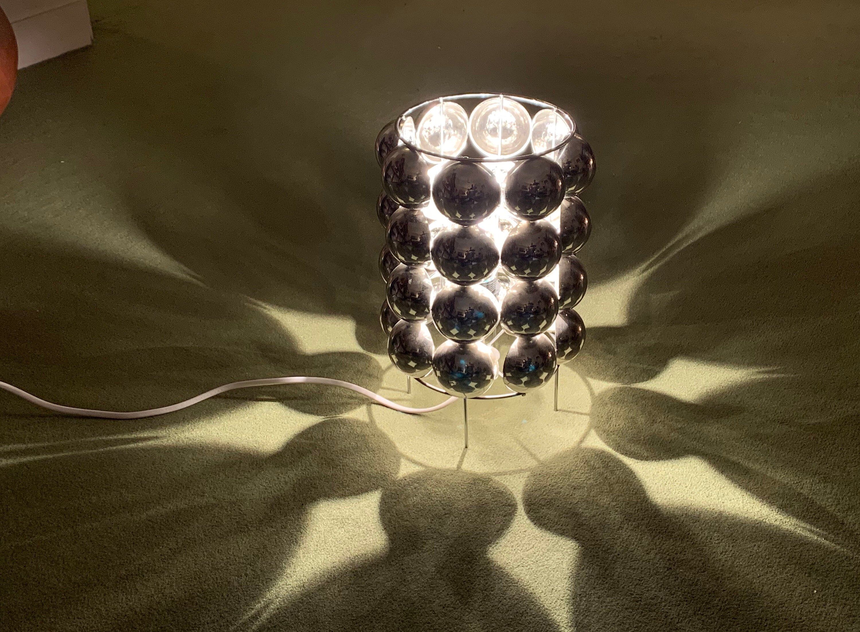Lamp with a half revolving spheres, 70s