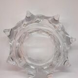 Empty ashtray-pockets in star-shaped crystal