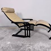 Rocking lounge chair, curved wood, leather, Viennese cane design.