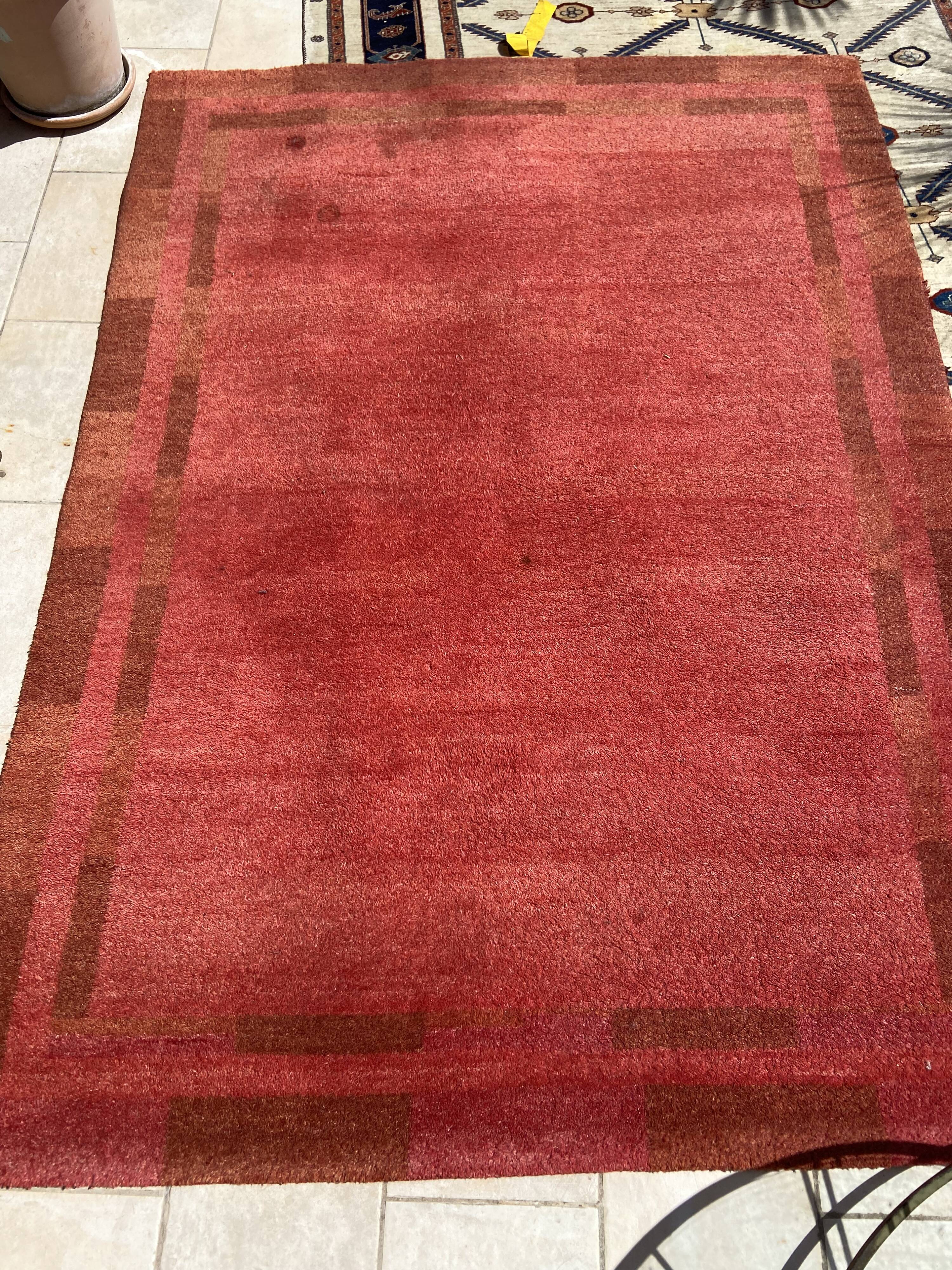 Handwoven carmine red gabbeh rug