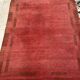Handwoven carmine red gabbeh rug