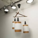 Scandinavian triangle pendant light in cascade with 3 opalines