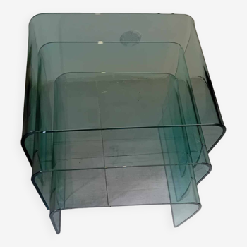 Suite of 3 nesting tables in curved glass from the 80s.