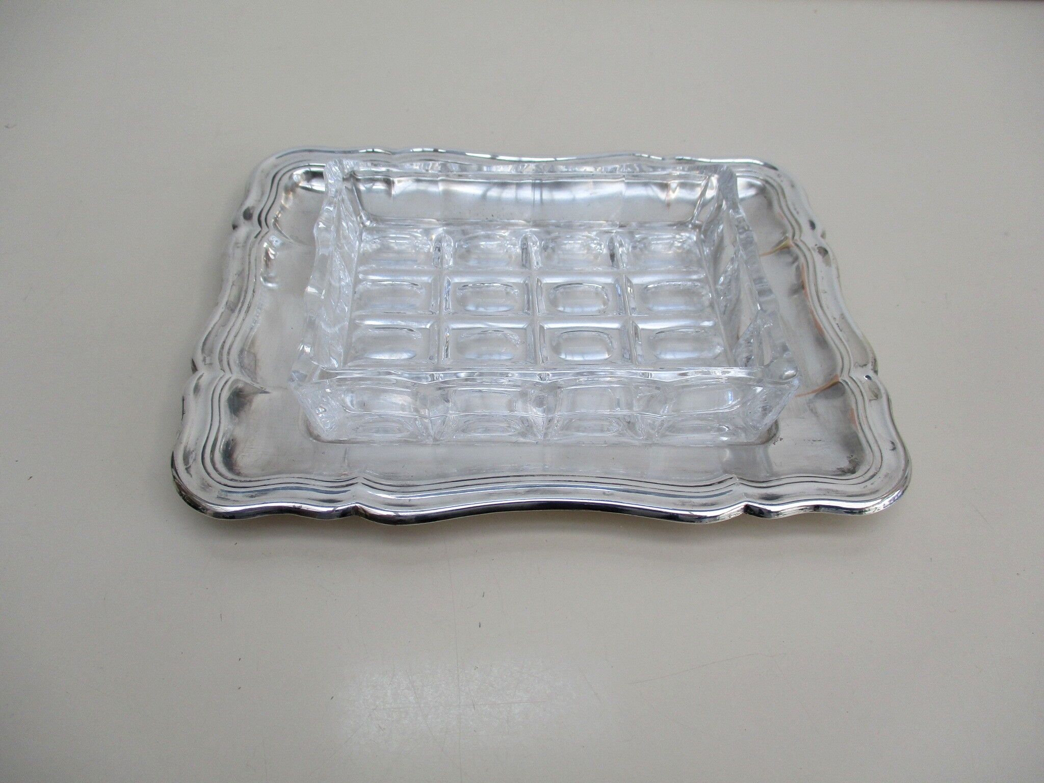 Butter silver metal and glass