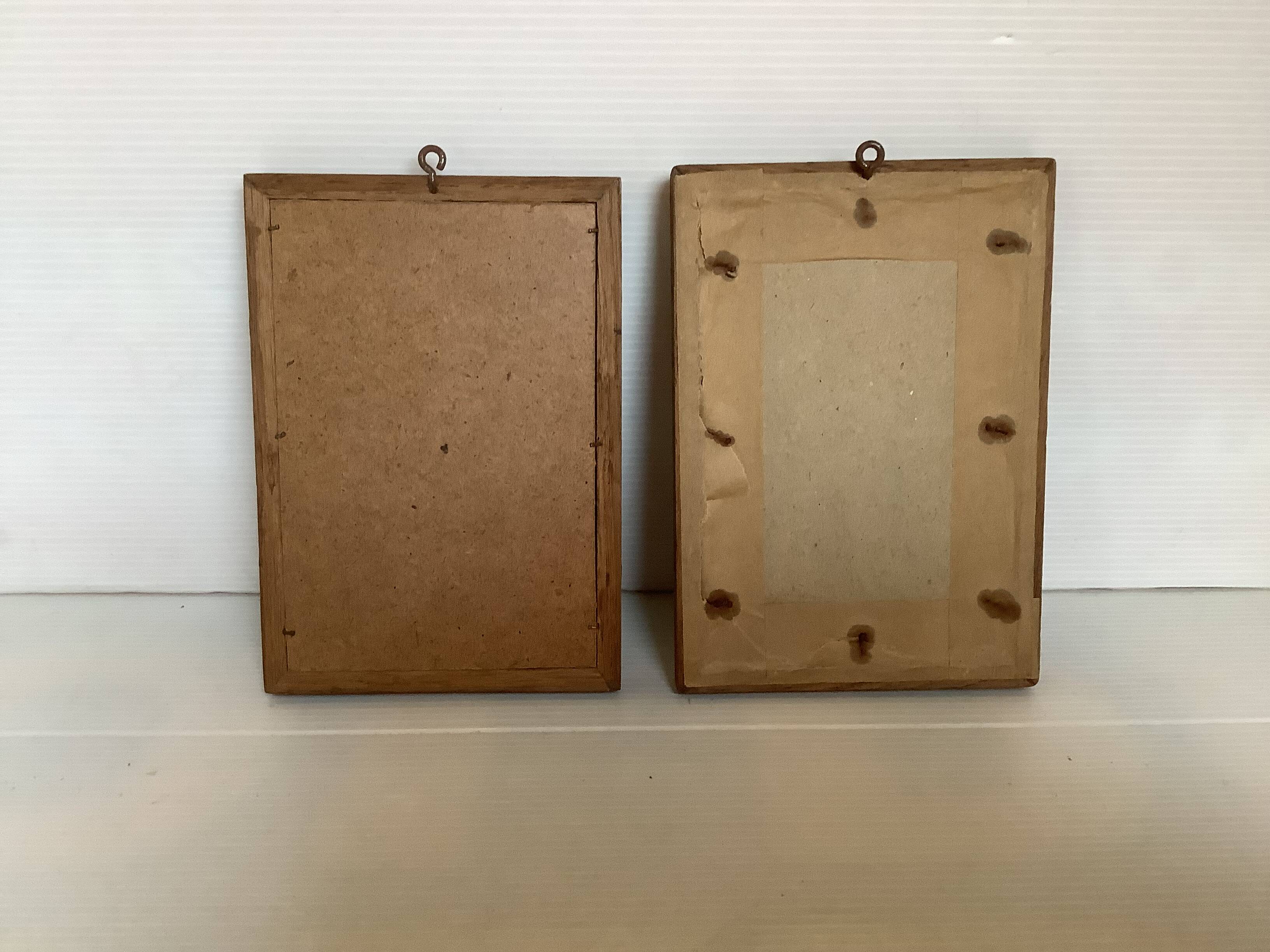 Pair of small frames with Spanish illustrations