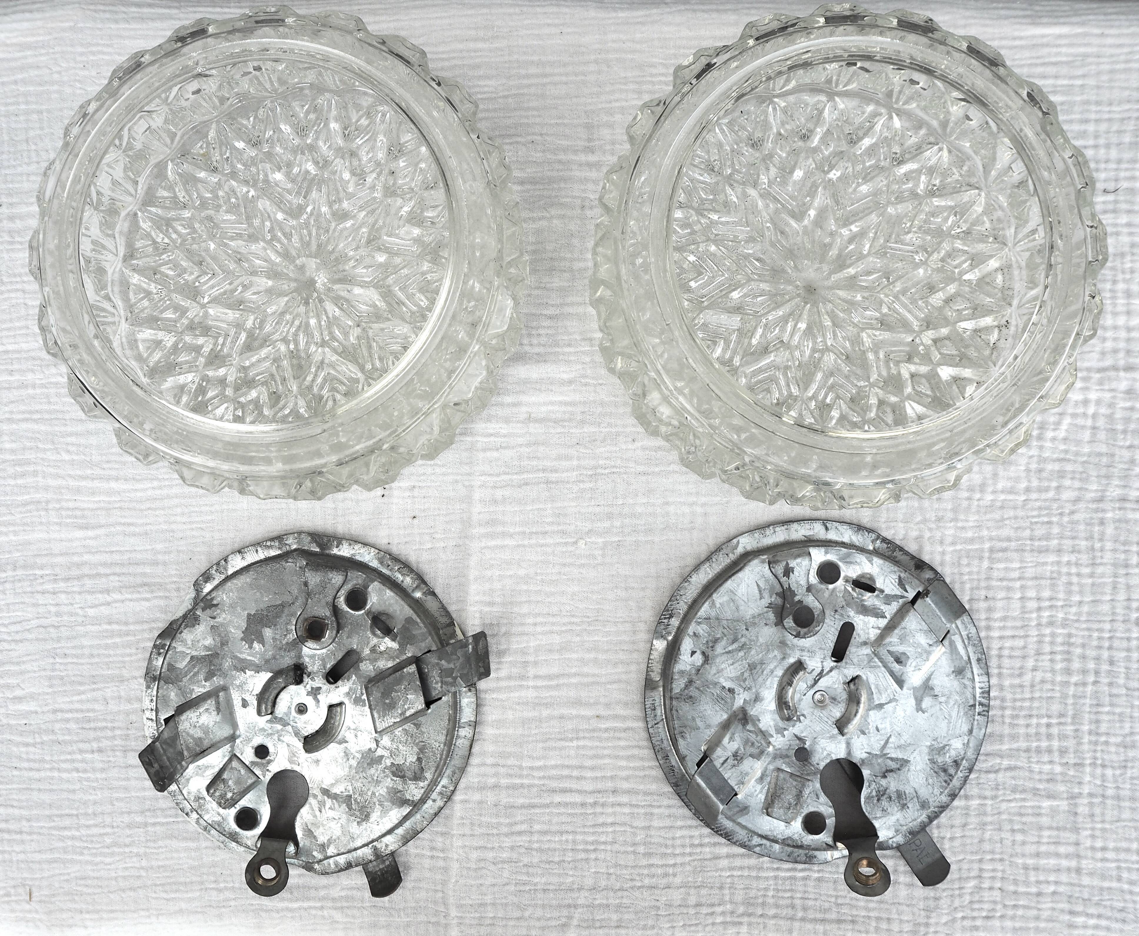 Pair of round ceiling lights in chiseled glass