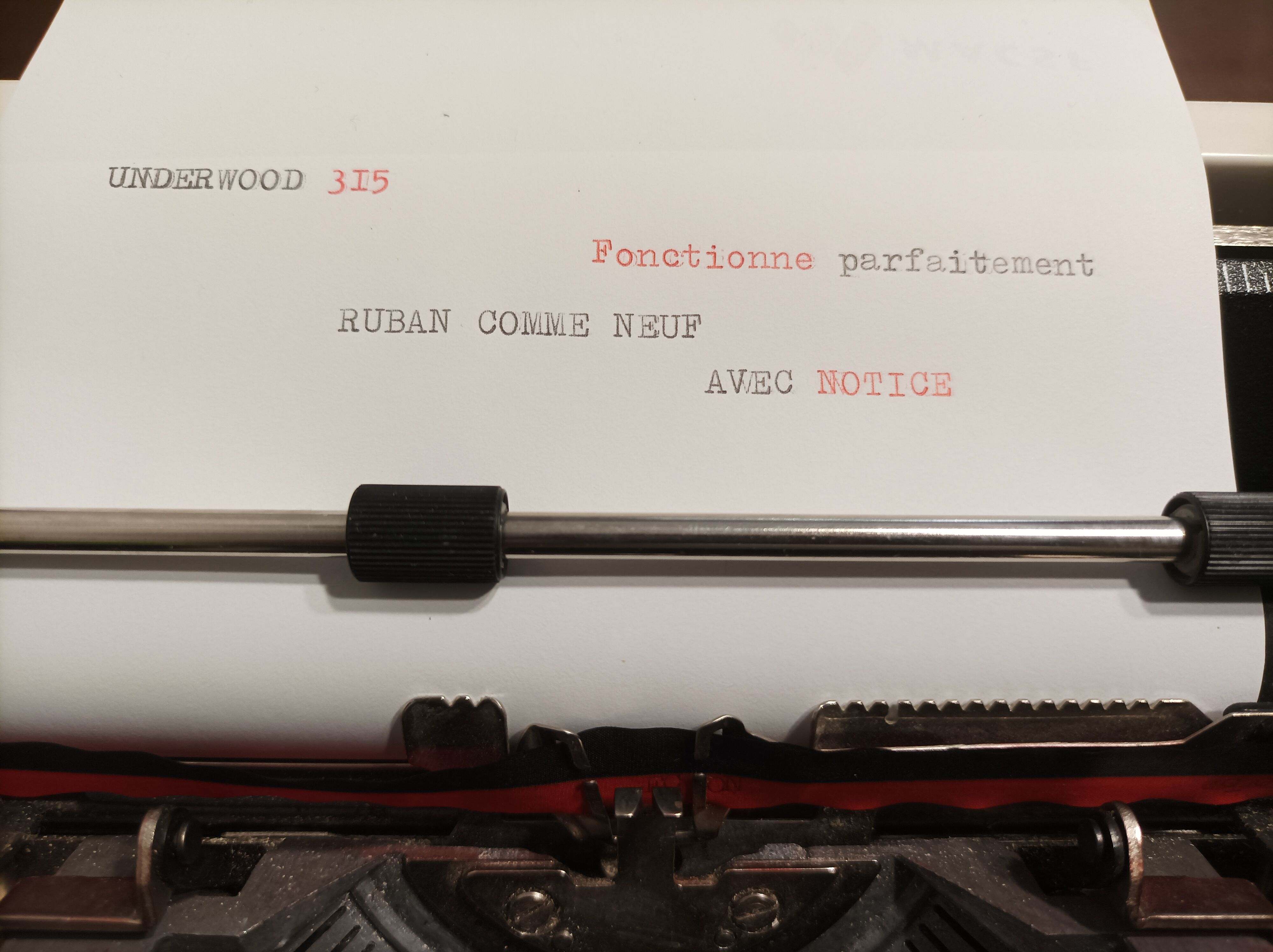 Green Underwood 315 typewriter with its briefcase