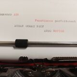 Green Underwood 315 typewriter with its briefcase
