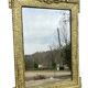 19th-century antique mirror in carved gilded wood, Napoleon style.
