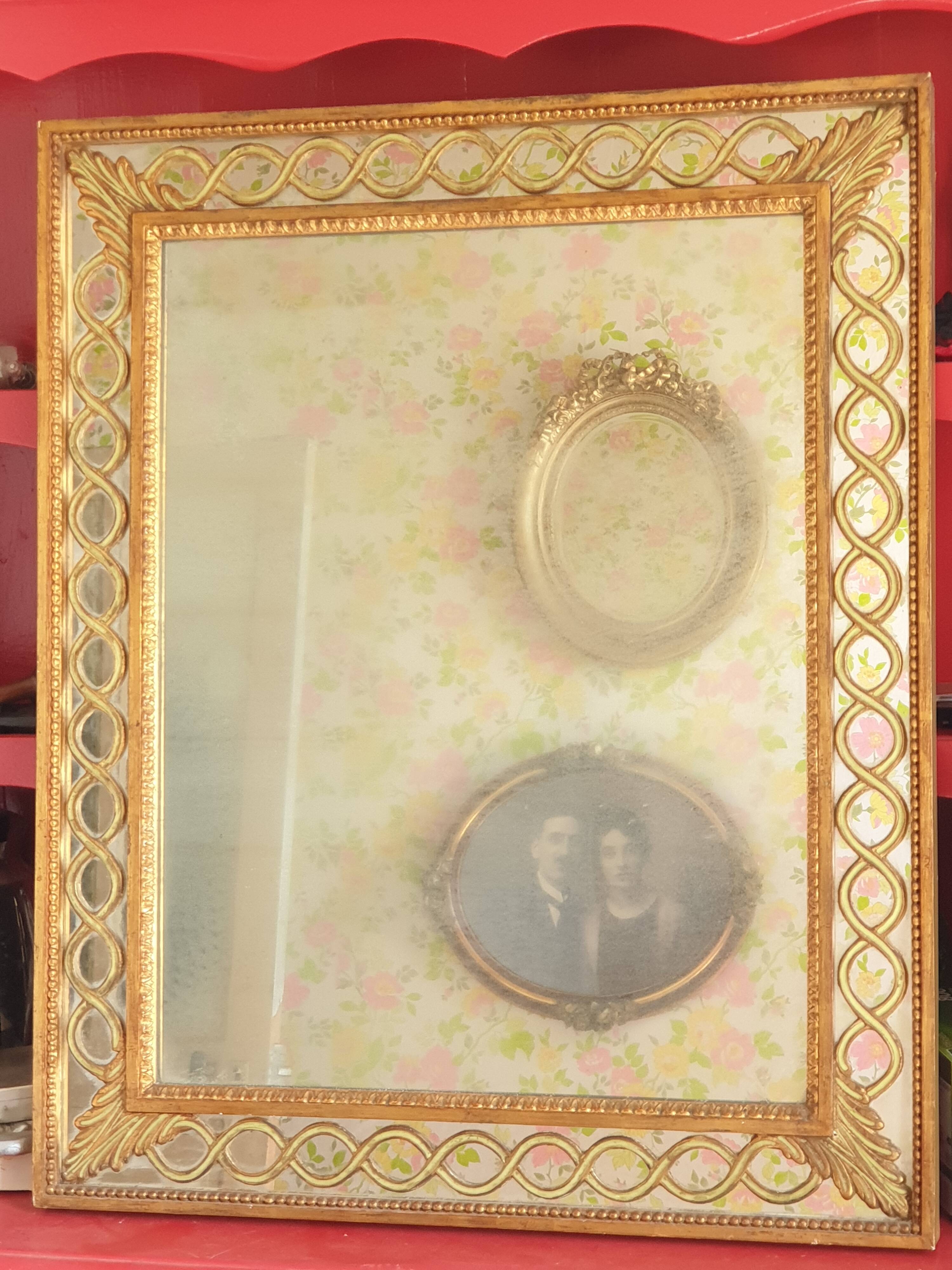 Classic antique mirror in gilded wood