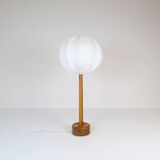 Mid-century solid teak table lamp from the 1960s Sweden.