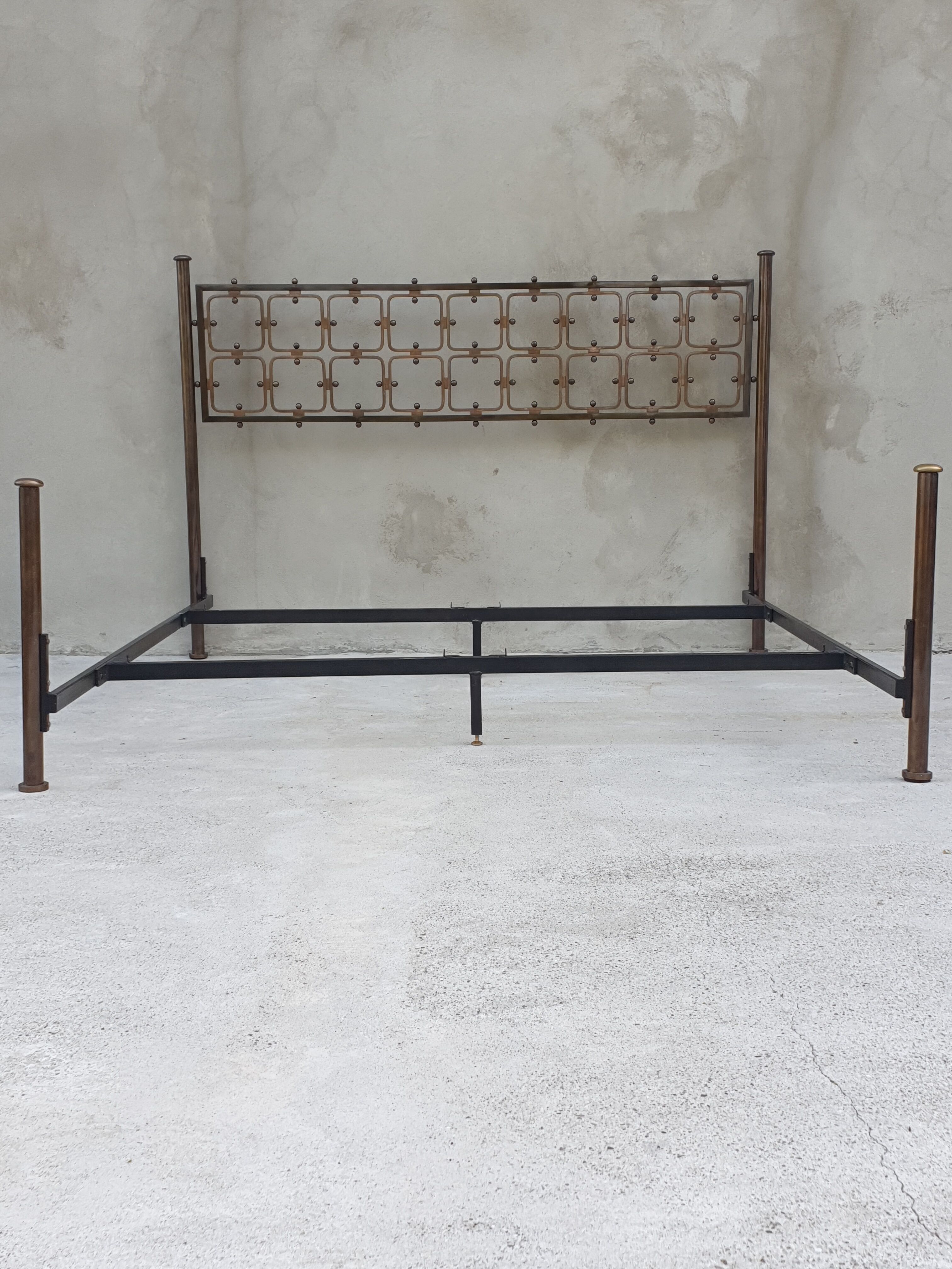 Double bed in burnished brass