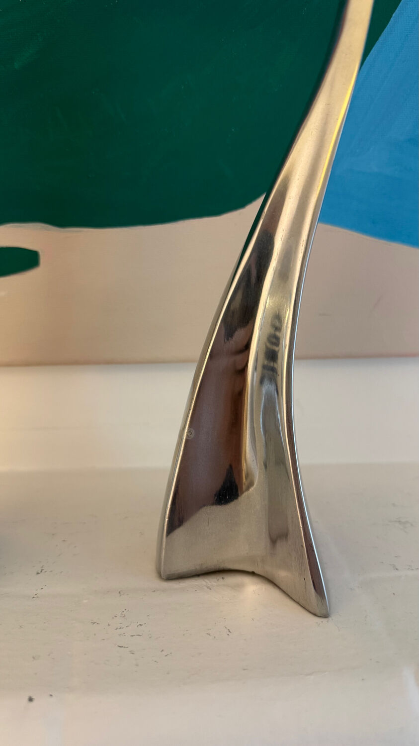 Set of 2 Swann candle holders by Matthew Hilton