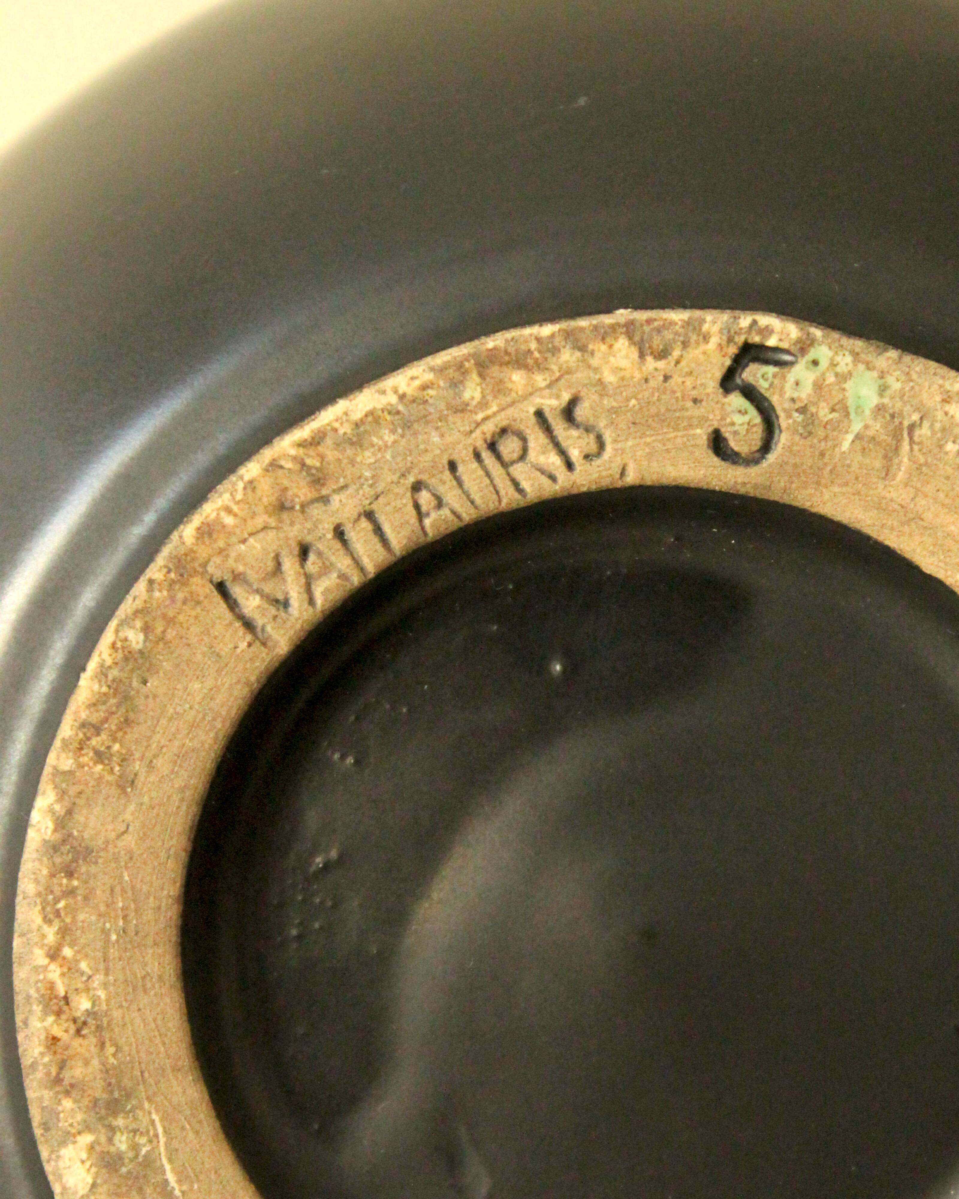 Two-handled vase, black and yellow glazed, in the style of Pol Chambost.