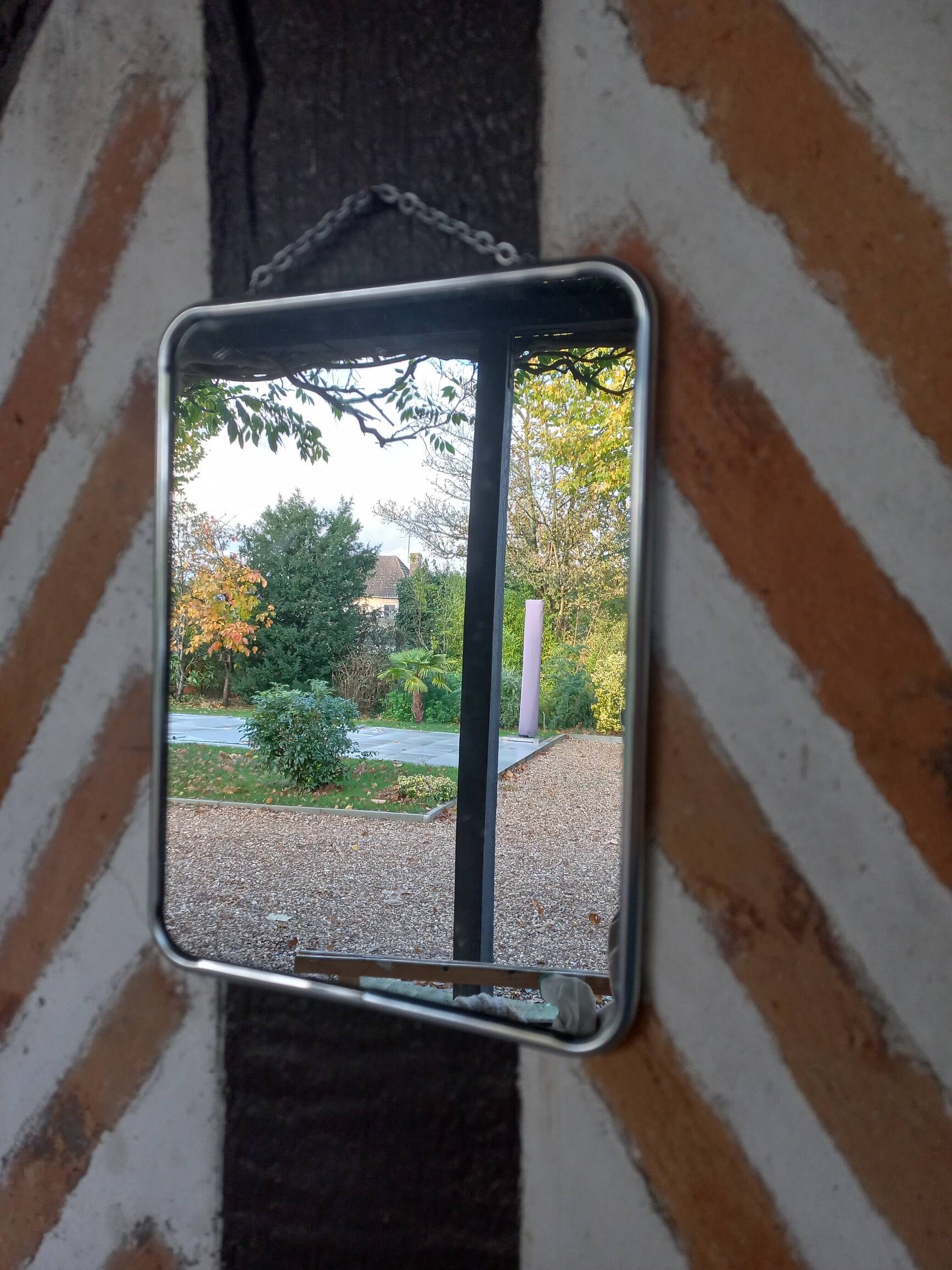 Barber mirror with chain