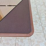 Table basse design en cuir et plateau en verre