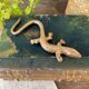 Small brass lizard