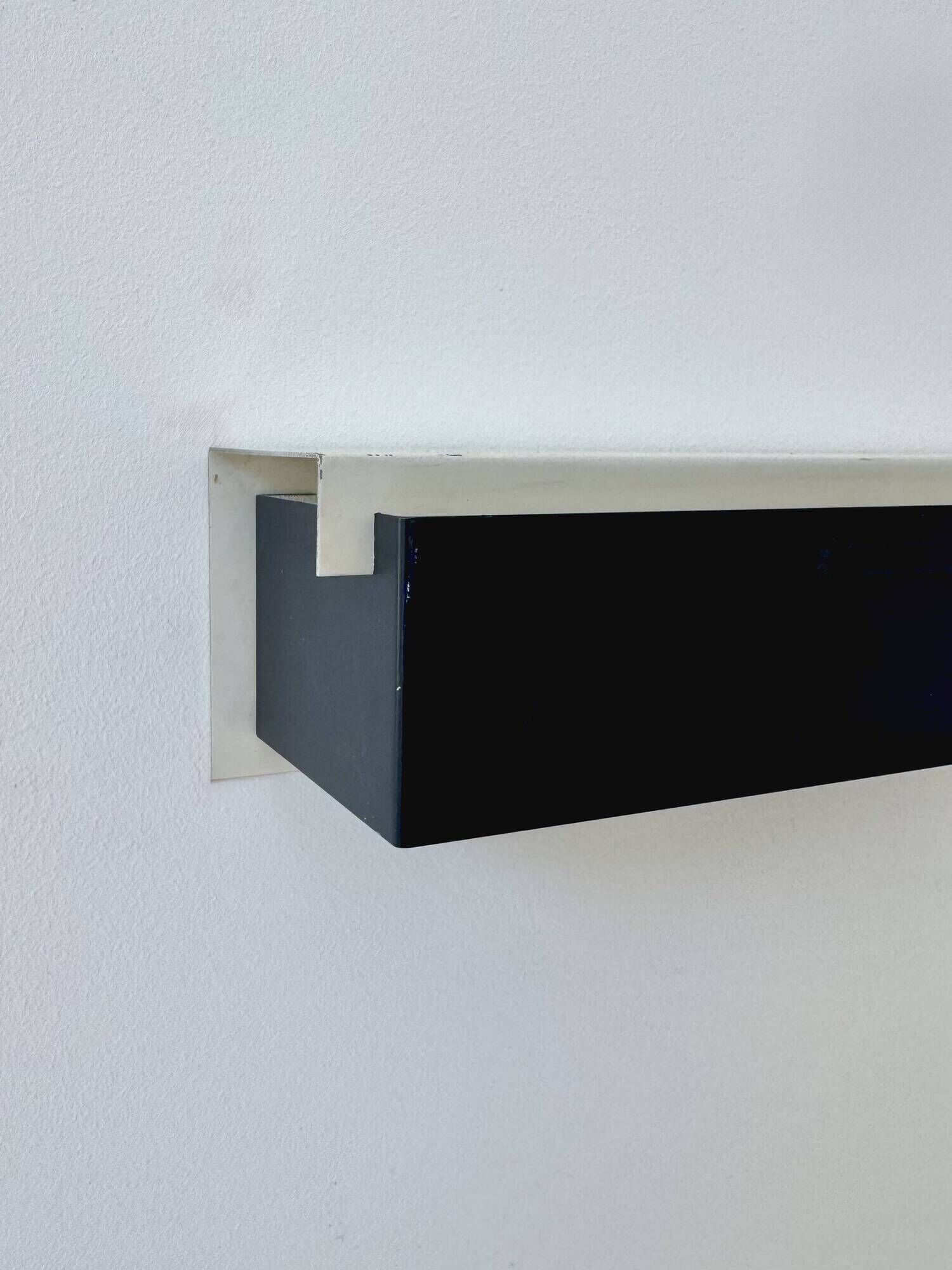 Pair of vintage wall sconces, painted black and white metal, Sweden 1970.