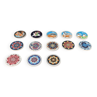 Set of 13 vintage ceramic coasters handmade by Lito Niarchos.