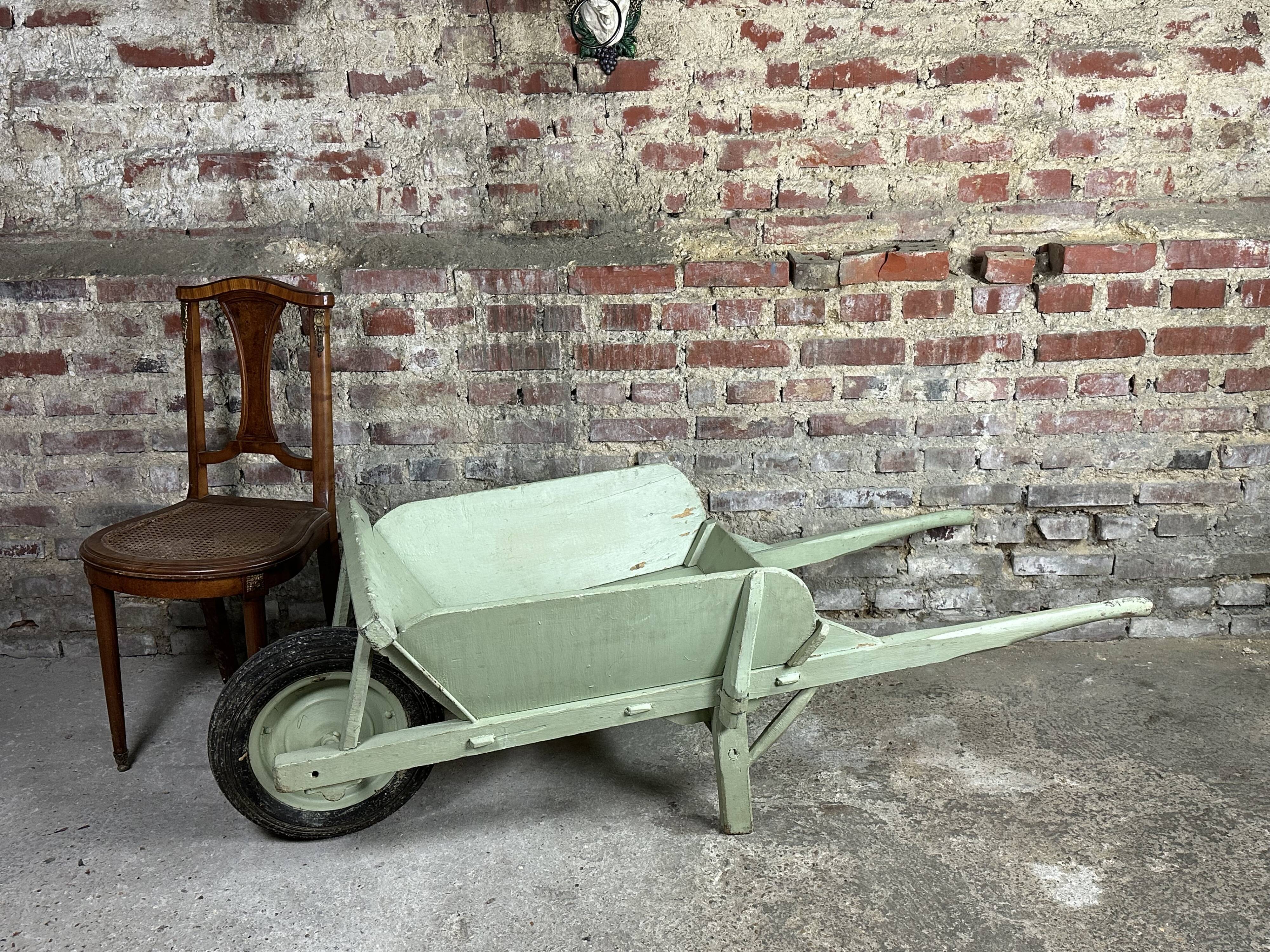 Antique wooden wheelbarrow
