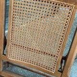 Vintage wooden and cane chaise longue