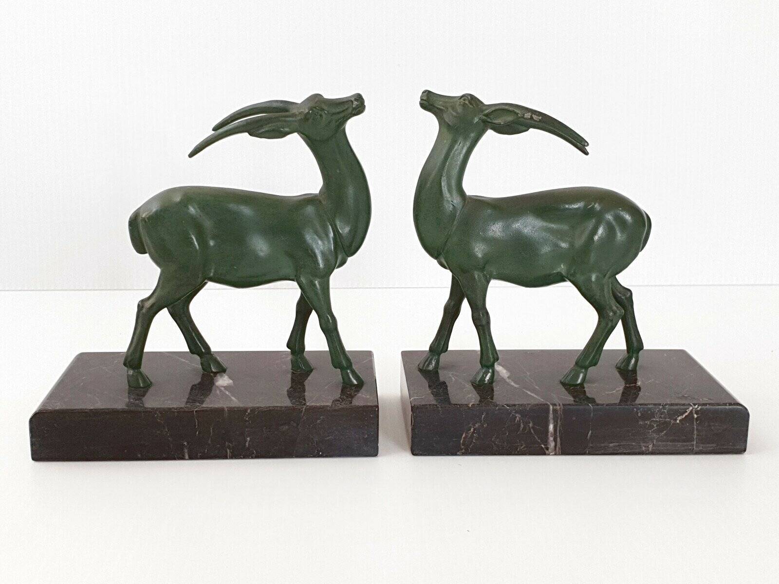 Pair of vintage ibex bookends from 1940-1950 in marble and metal.