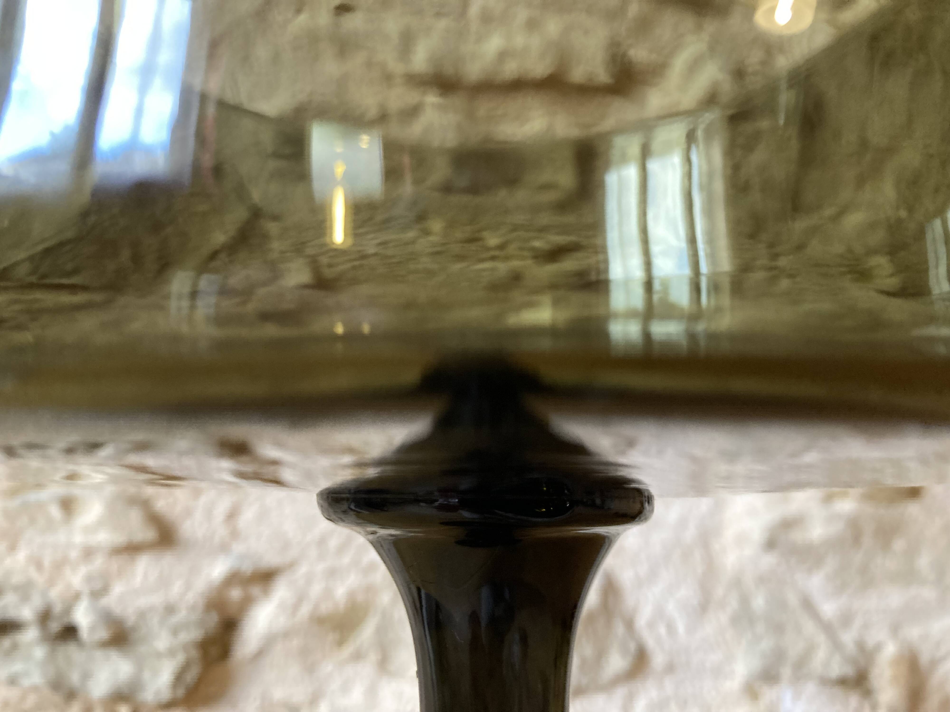 Large bowl in moss green tinted blown glass