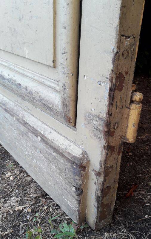 19th century double arched entrance door in oak with grilles and old glass