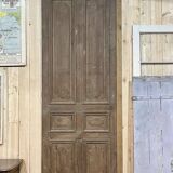 Large fir entrance door from the early 20th century