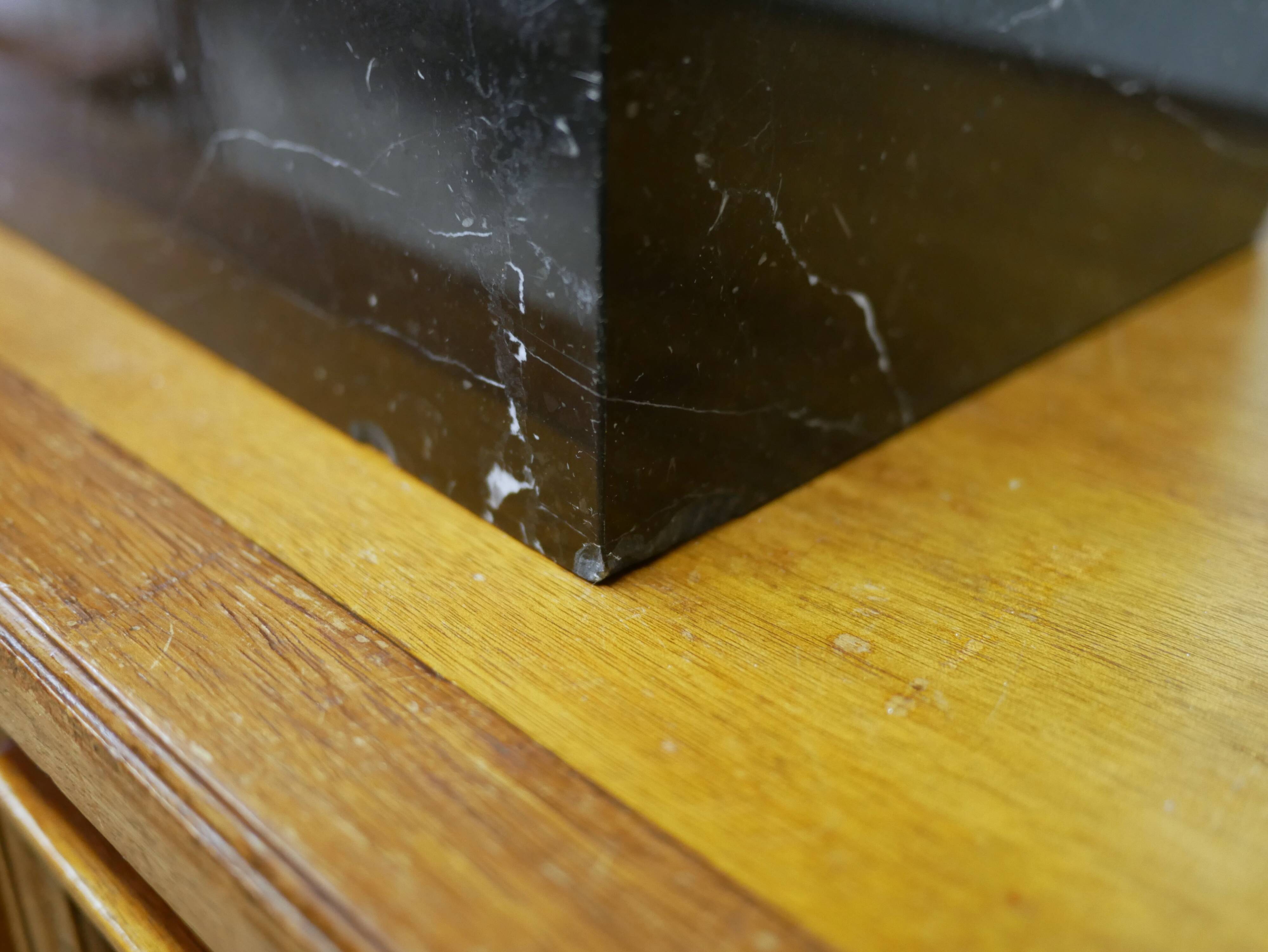 Buddha head sculpture, marble base