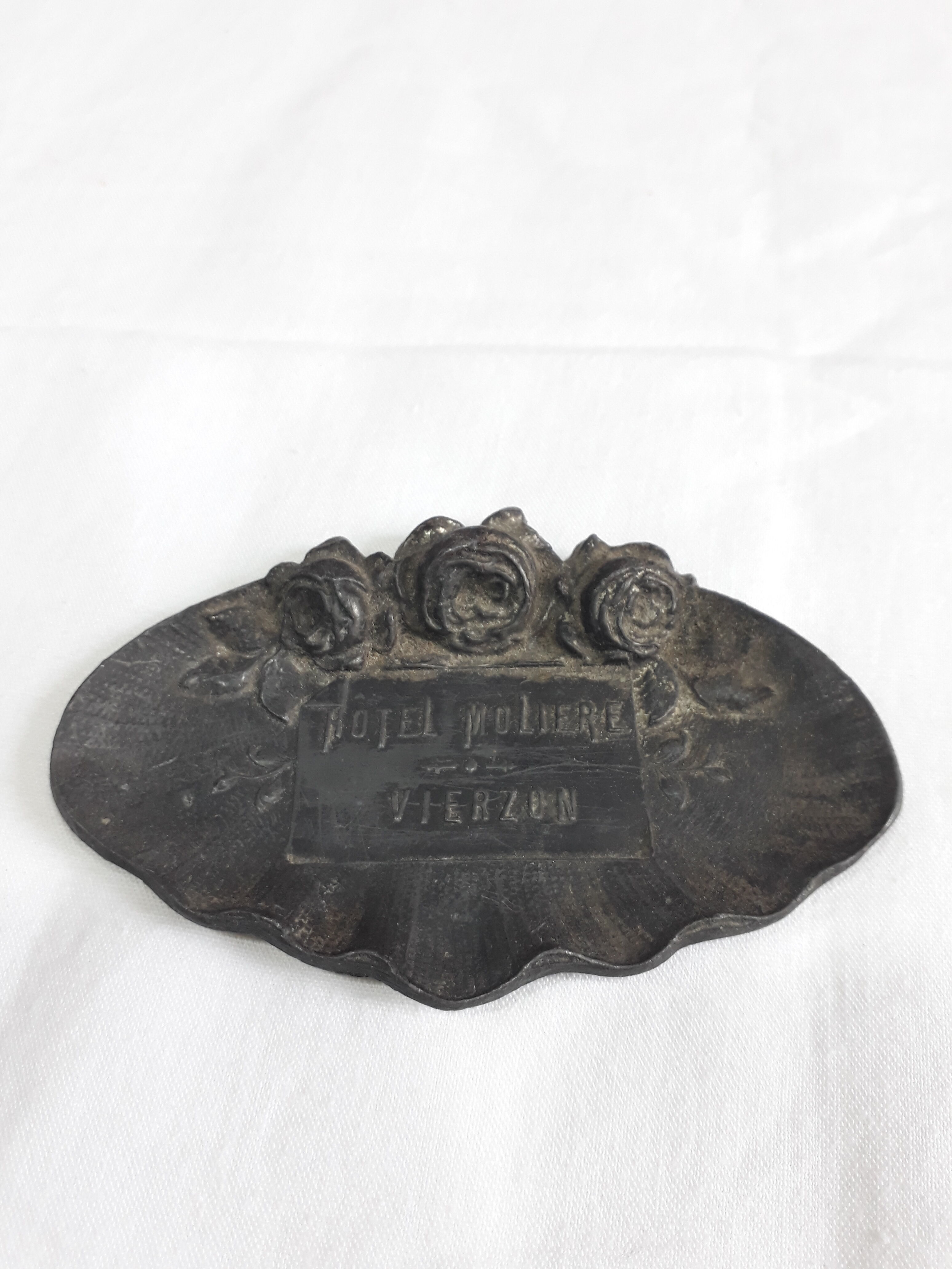 Old metal hotel plaque