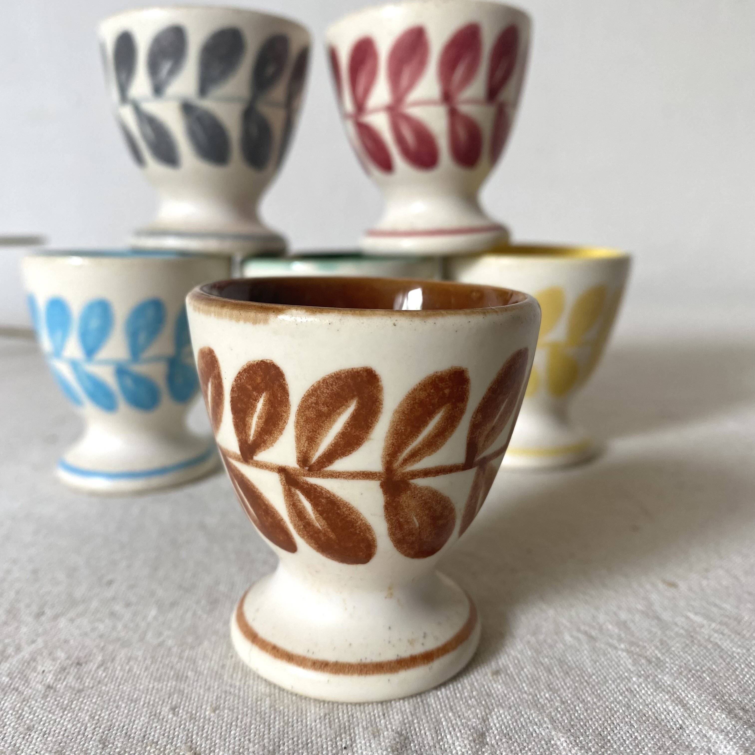 Antique earthenware egg cups