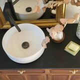 Vanity unit in solid walnut and Zimbabwean granite.