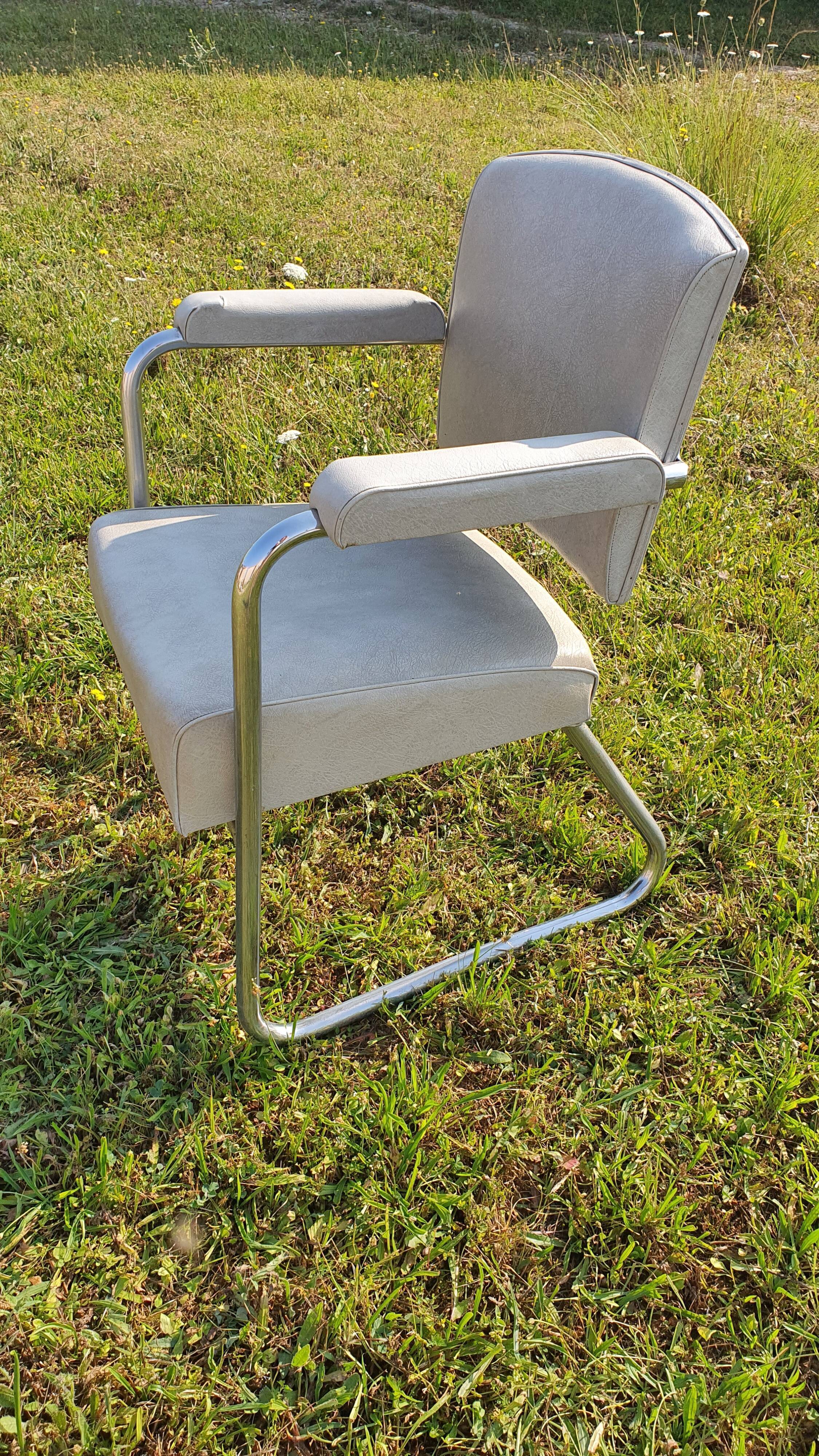 gray armchair wear skai see photo. Tubular frame. Sled feet.