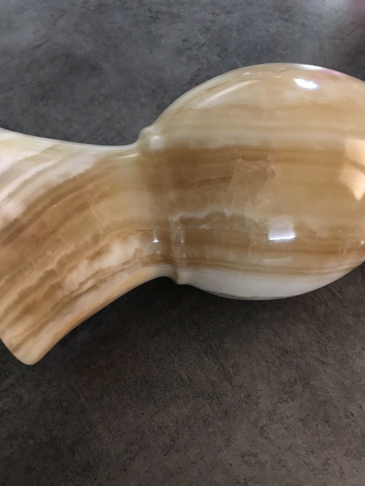 Vintage vase in marbled onyx stone shades of beige and brown