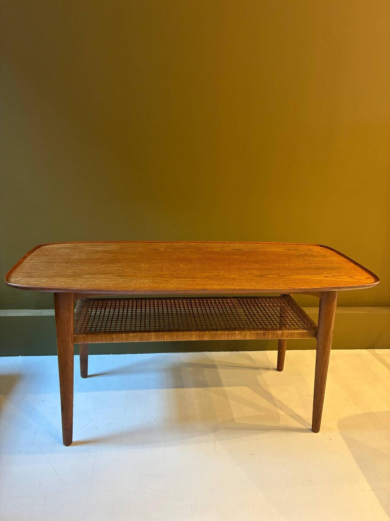 Teak and cane coffee table, 1970s.