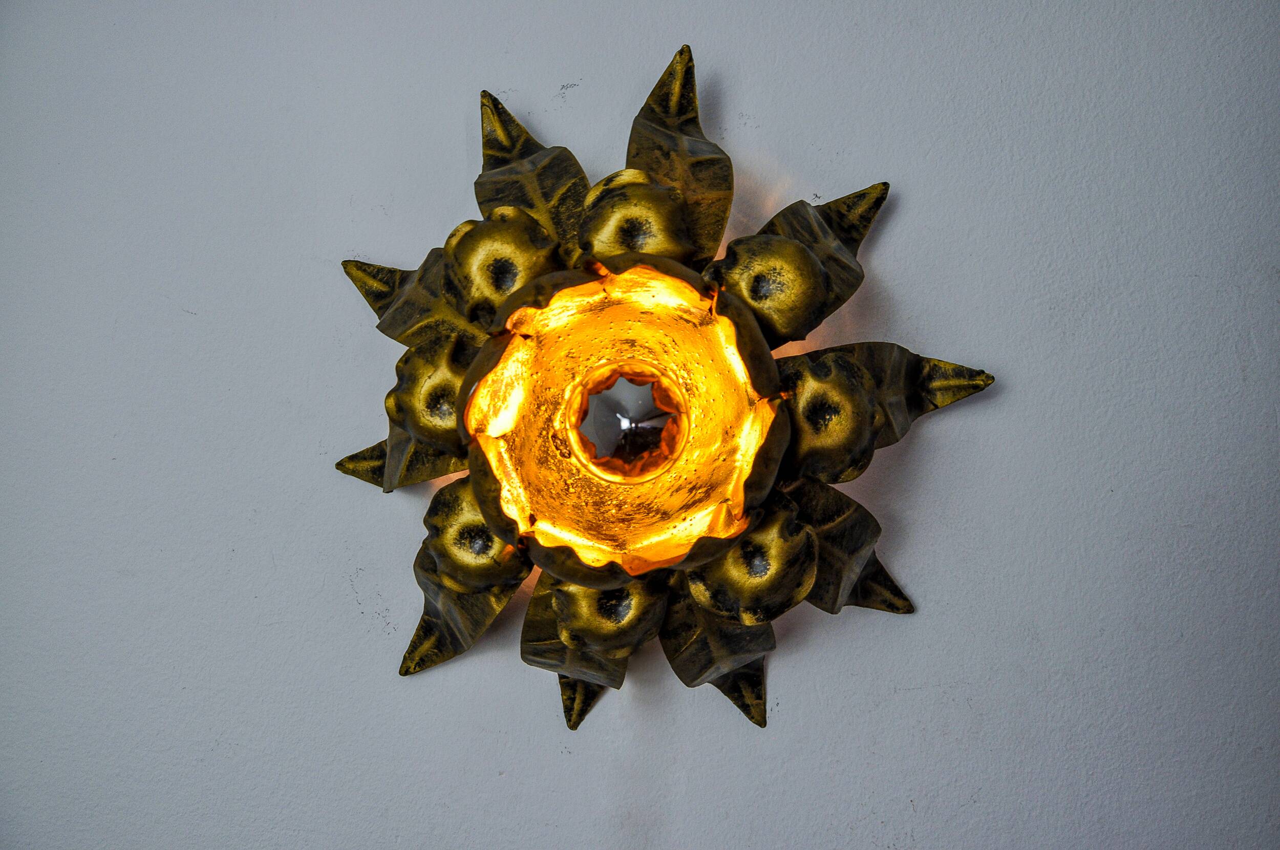 Sun wall lamp by ferro arte, metal and gold leaf, Spain, 1960
