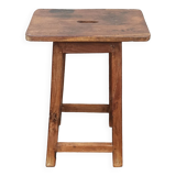 Old wooden high stool